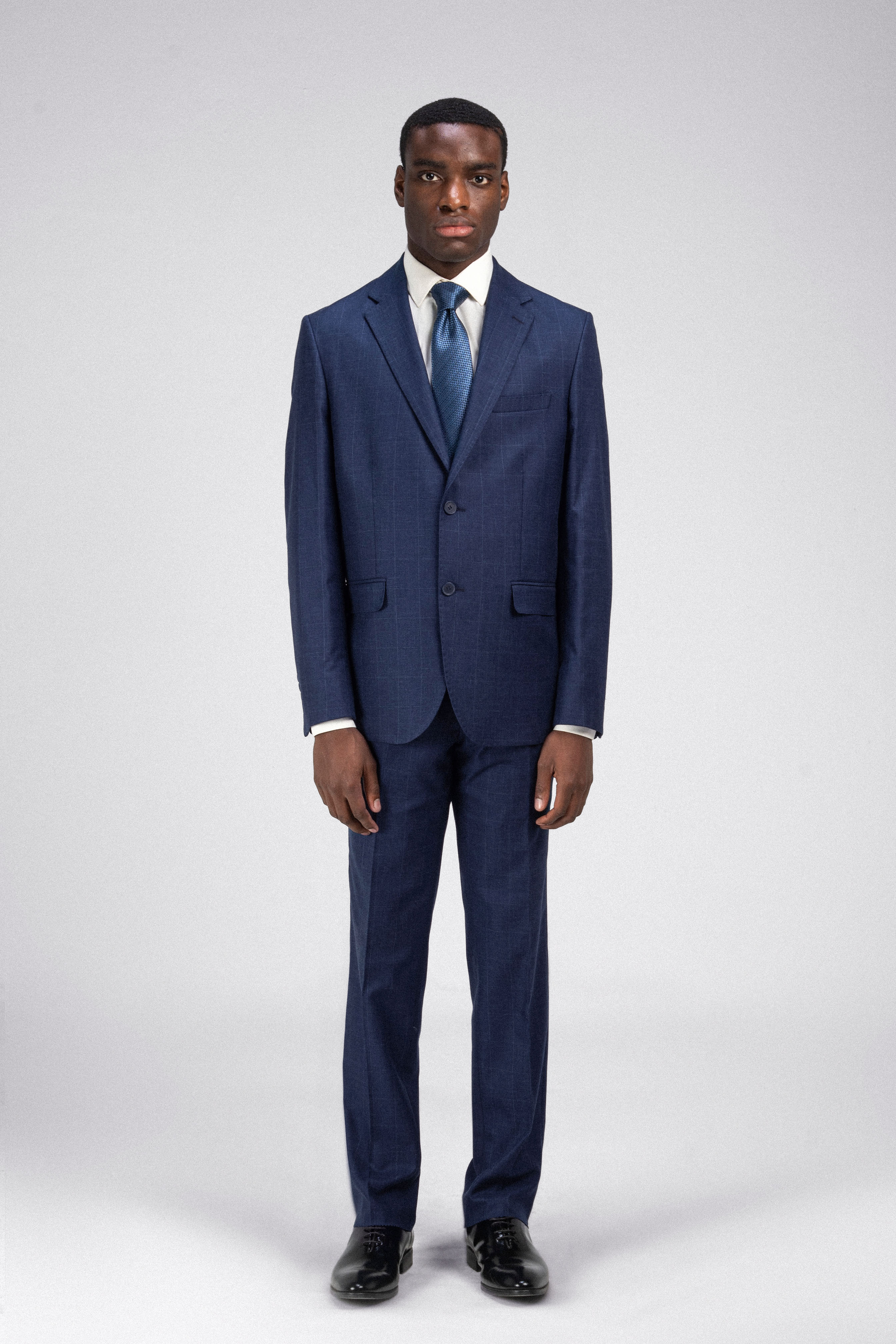 بدلة كحلي كارو