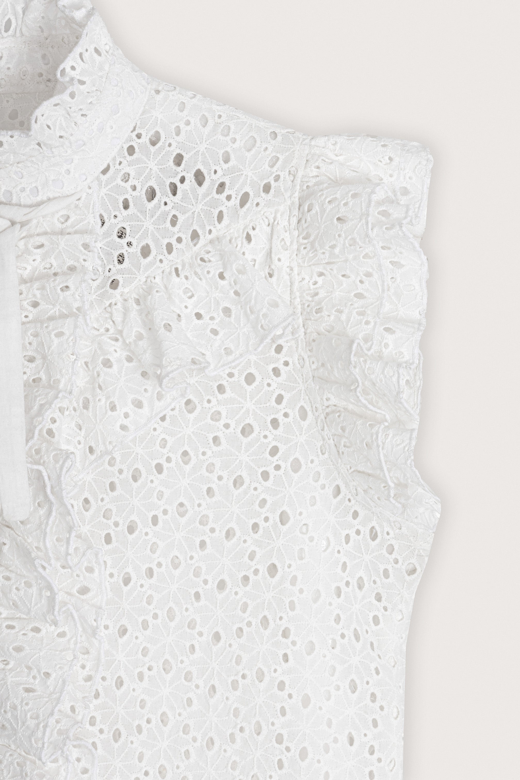 White Embroidered sleeveless blouse