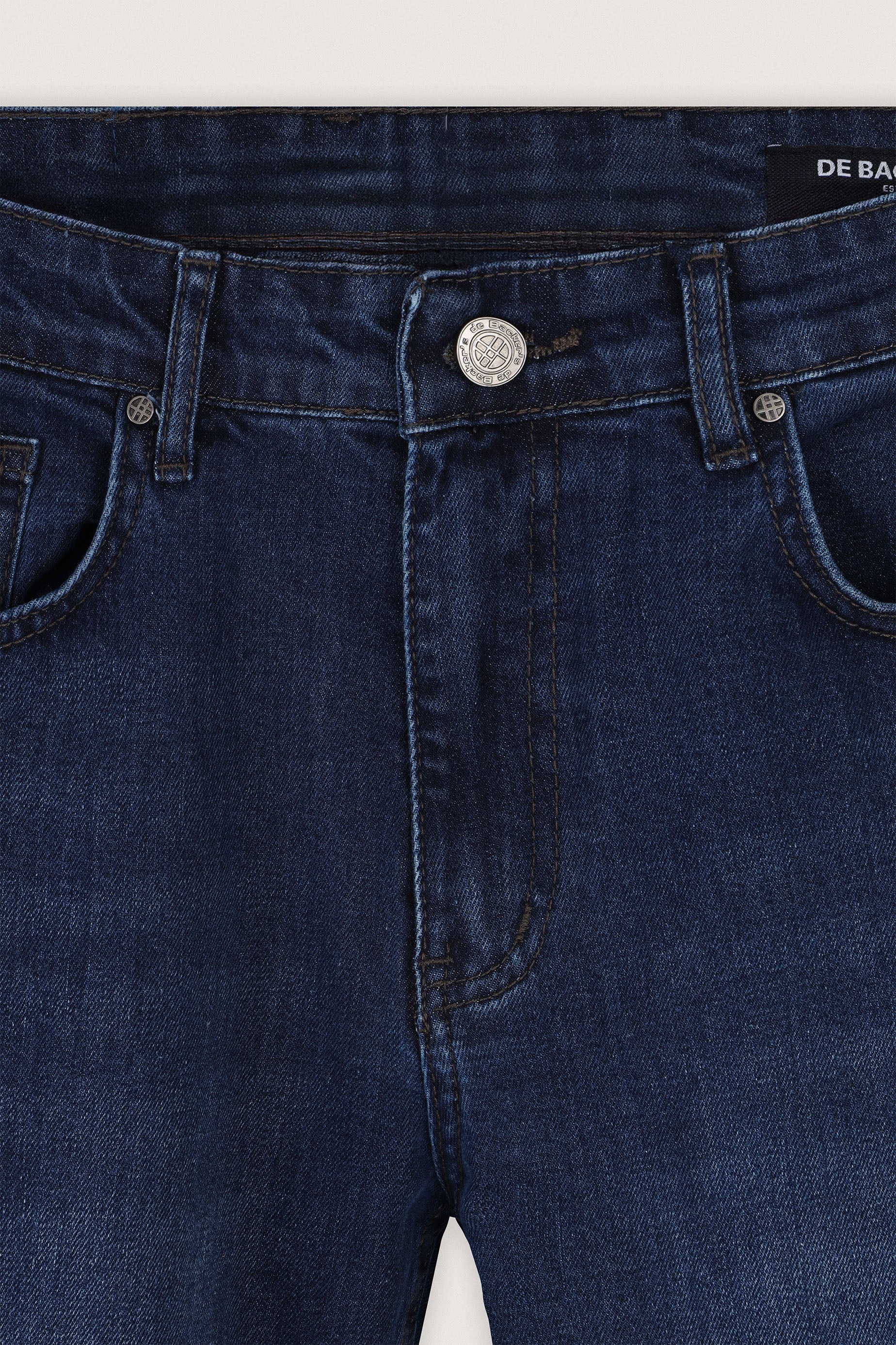 Mid–dark indigo blue Jeans