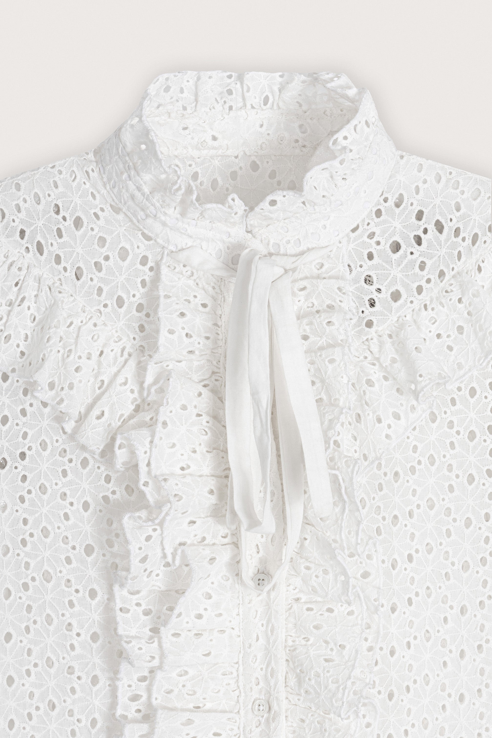 White Embroidered sleeveless blouse