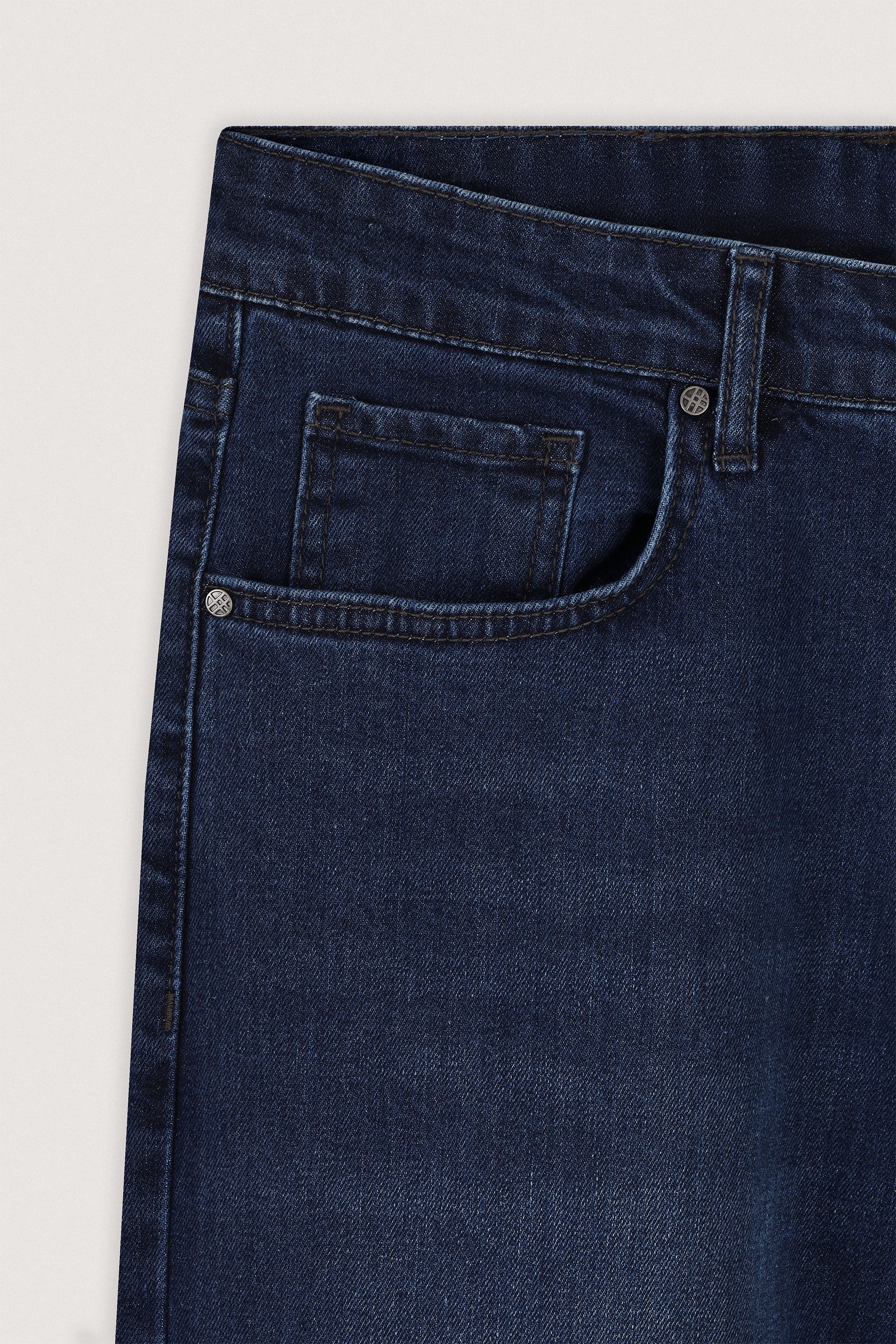 Mid–dark indigo blue Jeans