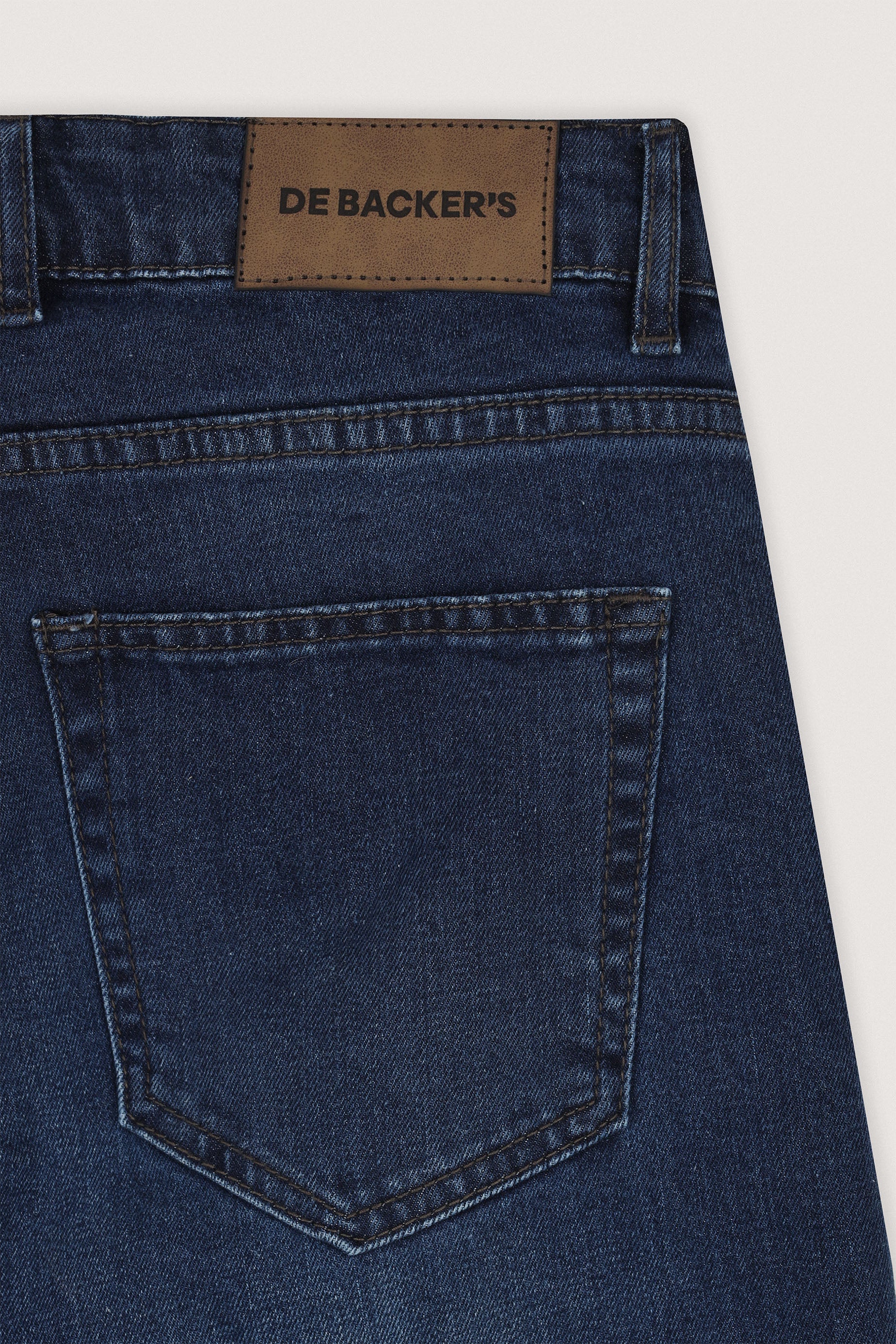 Mid–dark indigo blue Jeans